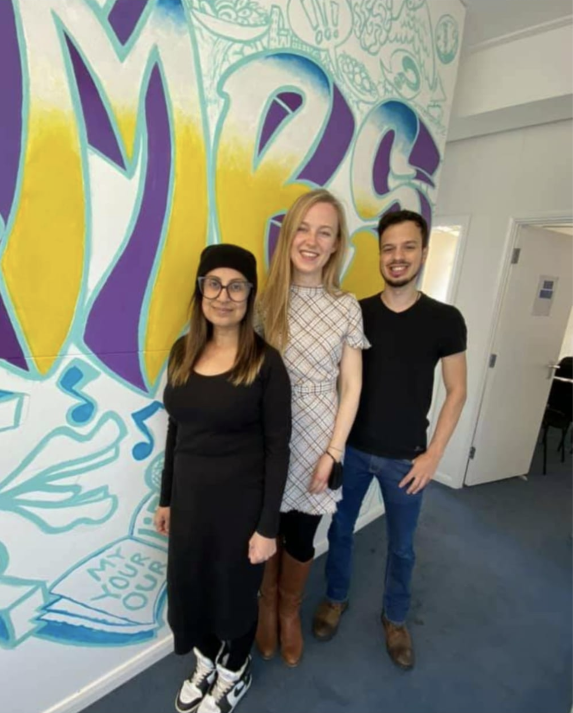 Write On! tutors Meg and Stefano with EMBS teacher Samina