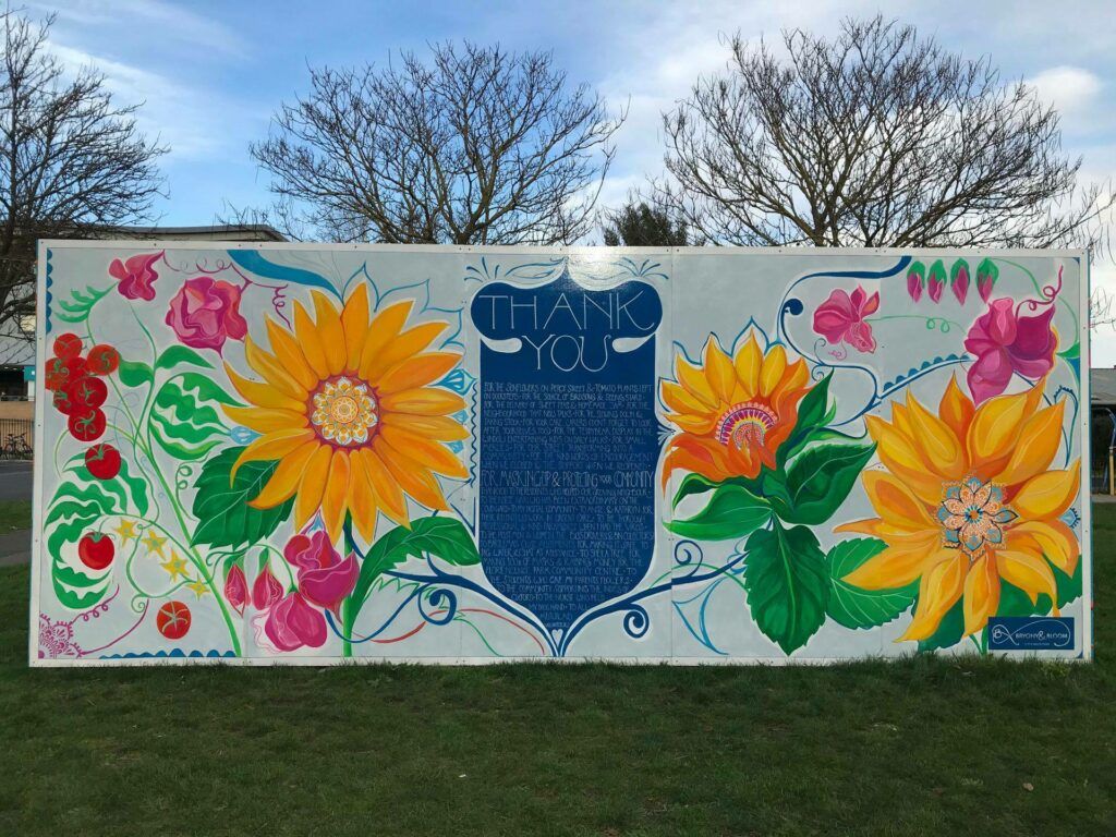 Bryony's sunflower Thank You mural in Manzil Way Gardens