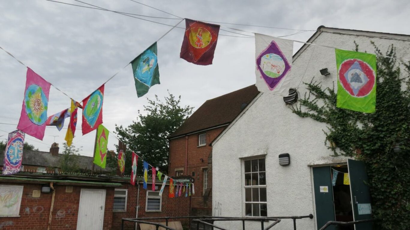 Colourful flags hanging in the Fusion courtyard